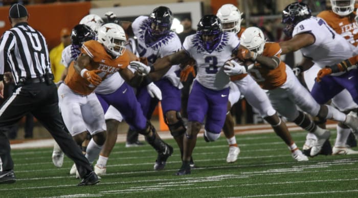 TCU running back Emari Demercado carries the ball in the game in Austin on November 12, 2022. TCU beat Texas 17-10.